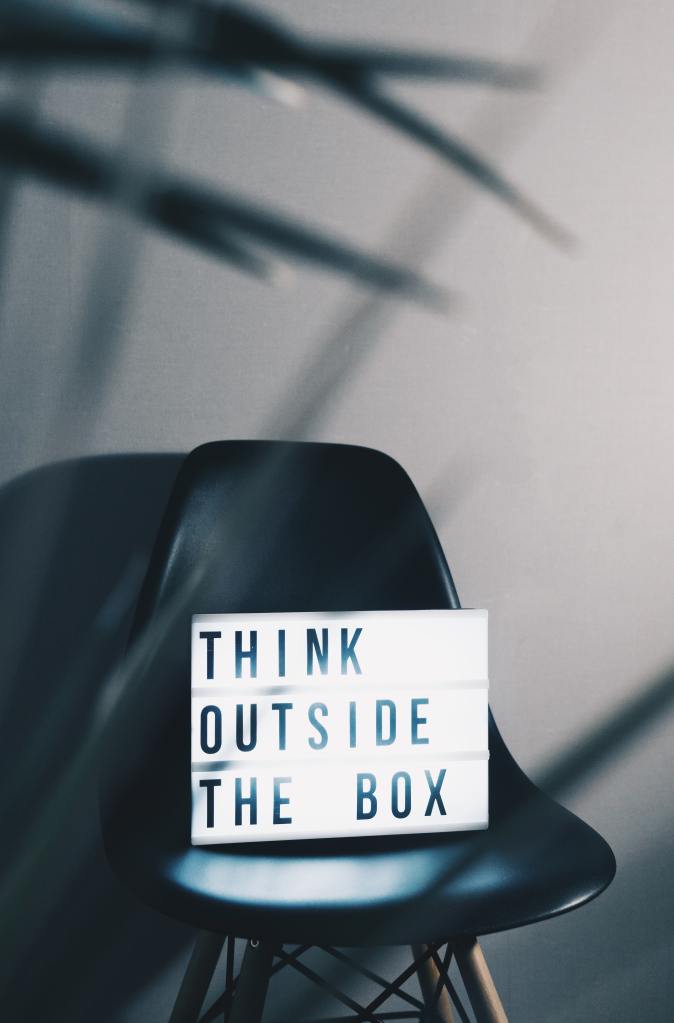 Cinema Lightbox saying 'Think Outside the Box' - Solva Group Inc.